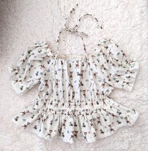 photograph of a cotton peasant top made of Disney's Bambi fabric