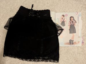 photograph of Liz Lisa skirt on top of an Otome no Sewing magazine spread of similar black frilly skirt