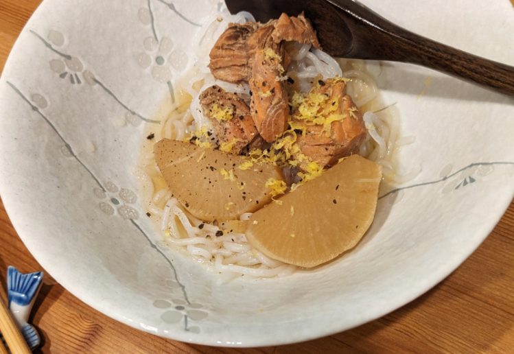 photo of salmon and daikon slices on a bed of shirataki noodles