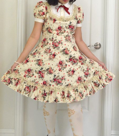 photograph of classic lolita cream floral print dress from Bodyline worn with Metamorphose socks and Secret Shop shoes
