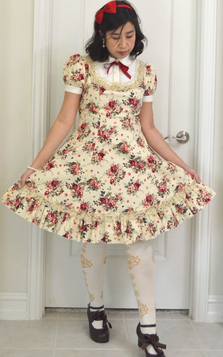 photograph of classic lolita cream floral print dress from Bodyline worn with Metamorphose socks and Secret Shop shoes