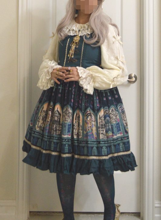 photo of Metamorphose Temps de Filles coord of Rose Palace jumperskirt in teal colorway with cream and gold accents