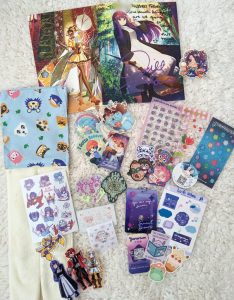 nimeuwu art market hauls today - signed posters from Brittany Lauda, Jill Harris and sticker from Rebecca Danae (voice actors). Animal Crossing towel from Whatswongart, Transformers stickers from plushishop, Frieren stickers from Frijolito, My Melody sticker from Mogurrt, Barbie and OTGW from Austin Lord, various videogame and lolita stickers from A Little Serotonin, planner and cute stickers from Inthebluemoon and Xiiyta, photocard holder and more fun stickers from Yunorium! (search artist by instagram or twitter handles)