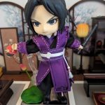 nendoroid doll wearing a purple and black hanfu inspired by Jiang Cheng in the "Grandmaster of Demonic Cultivation" donghua