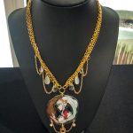 gold chain necklace with an acrylic pendant of Lailah from Tales of Zestiria, decorated with dangling faux crystal drops