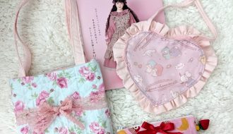 photograph of 3 handmade print fabric bags with Misako Aoki sewing book volume 2 in the background