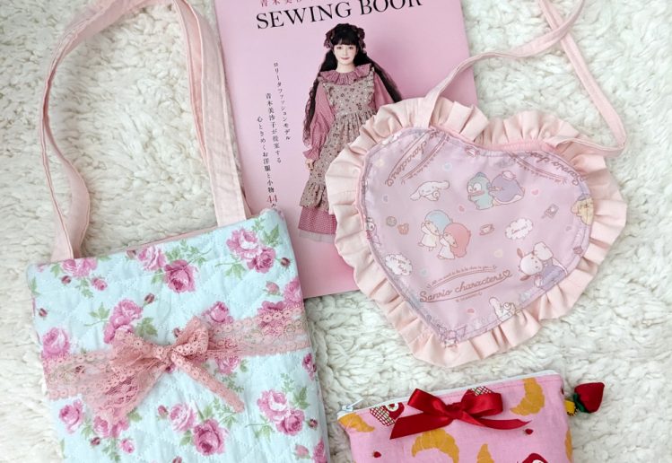 photograph of 3 handmade print fabric bags with Misako Aoki sewing book volume 2 in the background