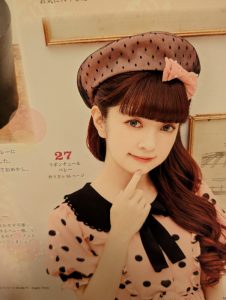 Misako wearing a handmade beret with lace overlay and small bow