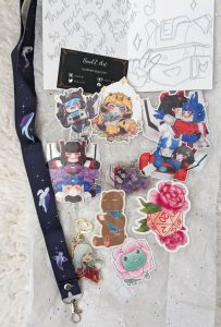 stickers and charm and lanyard purchases from soule art