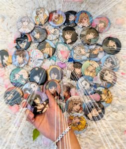 a ton of button badges with my own fanart, pressed by me!